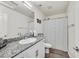 Clean bathroom with granite countertop, shower/tub combo, and modern vanity at 6867 Evening Orchid St, North Las Vegas, NV 89086