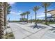 Open community space with benches and palm trees at 6867 Evening Orchid St, North Las Vegas, NV 89086