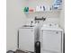 Convenient laundry room with washer and dryer included at 6867 Evening Orchid St, North Las Vegas, NV 89086