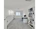 Spacious loft with built-in shelving and workspace at 6867 Evening Orchid St, North Las Vegas, NV 89086