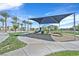 Community playground with shaded play area at 6867 Evening Orchid St, North Las Vegas, NV 89086