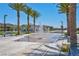 Relaxing water feature with palm trees at 6867 Evening Orchid St, North Las Vegas, NV 89086