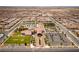 An aerial shot of a community with beautiful club house, a pool, and lush green lawns at 723 Orange Plume Walk # 0, Henderson, NV 89011