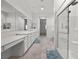 Spacious bathroom with double sinks, vanity area, and glass shower at 723 Orange Plume Walk # 0, Henderson, NV 89011