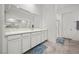 Bright bathroom with a large vanity, cabinets and double sinks at 723 Orange Plume Walk # 0, Henderson, NV 89011
