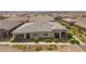 Attractive single-story home with covered front porches and neatly landscaped front yard, perfect for enjoying the outdoors at 723 Orange Plume Walk # 0, Henderson, NV 89011