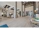 Expansive lobby featuring high ceilings, elegant lighting fixtures, comfortable seating and inviting ambiance at 723 Orange Plume Walk # 0, Henderson, NV 89011