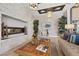Inviting lounge area featuring stylish decor, a cozy fireplace, plush seating, and contemporary design elements at 723 Orange Plume Walk # 0, Henderson, NV 89011