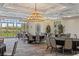 Bright meeting room featuring round tables, stylish lighting and views of the community at 723 Orange Plume Walk # 0, Henderson, NV 89011