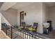 Cozy covered patio with seating area with a table, chairs and grill, perfect for outdoor relaxation at 723 Orange Plume Walk # 0, Henderson, NV 89011