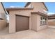 Attached garage with brown door and ample space at 757 Black Palace St, Henderson, NV 89011