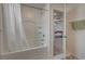 Bathroom with shower/tub combo and access to bedroom at 7675 W Mistral Ave, Las Vegas, NV 89113