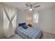 Cozy bedroom with a double bed and ceiling fan at 7675 W Mistral Ave, Las Vegas, NV 89113