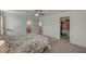 Bright bedroom with carpeted floors and large closet at 7675 W Mistral Ave, Las Vegas, NV 89113
