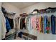Walk-in closet with ample shelving and hanging space at 7675 W Mistral Ave, Las Vegas, NV 89113