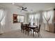 Dining room with a large wooden table and matching chairs at 7675 W Mistral Ave, Las Vegas, NV 89113
