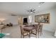 Dining room with a large wooden table and matching chairs at 7675 W Mistral Ave, Las Vegas, NV 89113