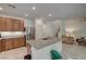 Modern kitchen with stainless steel appliances and granite countertop at 7675 W Mistral Ave, Las Vegas, NV 89113