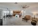 Open living room with kitchen and dining area visible at 7675 W Mistral Ave, Las Vegas, NV 89113