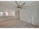 Bright loft bedroom with ceiling fan and carpet at 7675 W Mistral Ave, Las Vegas, NV 89113