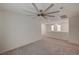 Spacious loft area with ceiling fan and carpet at 7675 W Mistral Ave, Las Vegas, NV 89113
