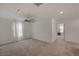 Bright and airy loft bedroom with ceiling fan and neutral decor at 7675 W Mistral Ave, Las Vegas, NV 89113