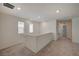 Loft hallway with carpet and neutral walls at 7675 W Mistral Ave, Las Vegas, NV 89113