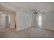 Spacious loft area with ceiling fan and carpet at 7675 W Mistral Ave, Las Vegas, NV 89113