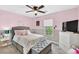 Charming bedroom with pink walls and a comfortable bed at 772 La Tosca St, Las Vegas, NV 89138