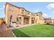 Large backyard with patio, grill, and trampoline at 8136 Little Skye Ct, Las Vegas, NV 89166