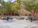 Picnic tables and benches in a shaded area at 8136 Little Skye Ct, Las Vegas, NV 89166