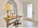 Bright entryway with console table, lamp, and modern decor at 8136 Little Skye Ct, Las Vegas, NV 89166