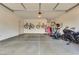 Garage with bikes, exercise equipment, and motorcycle at 8136 Little Skye Ct, Las Vegas, NV 89166