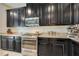 Modern kitchen features stainless steel appliances and granite countertops at 8136 Little Skye Ct, Las Vegas, NV 89166