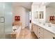 Bathroom view highlighting a glass shower, garden tub, and double vanity at 830 Cozette Ct # 102, Las Vegas, NV 89144