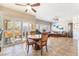 Dining area offering tile flooring and lots of natural light with convenient access to the living room at 830 Cozette Ct # 102, Las Vegas, NV 89144