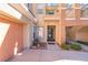 Townhome featuring a private front entrance, two-car garage, and inviting curb appeal at 830 Cozette Ct # 102, Las Vegas, NV 89144