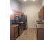 Kitchen with stainless steel appliances and wood cabinets at 8985 S Durango Dr # 2094, Las Vegas, NV 89113