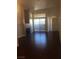 Living room with fireplace and sliding glass doors at 8985 S Durango Dr # 2094, Las Vegas, NV 89113