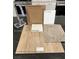 Sample of interior home finishes including Benton Quill upgraded cabinets and Layton Lake Driftwood luxury vinyl plank at 9156 Benton Woods St, Las Vegas, NV 89113