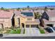 Beautiful elevated view of a well-maintained two-story home with solar panels at 10654 Sidlaw Hills Ct, Las Vegas, NV 89141
