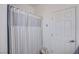 Relaxing bathroom featuring a shower with decorative striped curtain at 10654 Sidlaw Hills Ct, Las Vegas, NV 89141