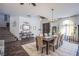Inviting dining space adjacent to the stairs and living area, perfect for gatherings at 10654 Sidlaw Hills Ct, Las Vegas, NV 89141