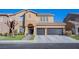 Stunning two-story home with manicured lawn and a two car garage at 10654 Sidlaw Hills Ct, Las Vegas, NV 89141