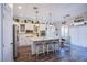 Modern kitchen featuring stainless steel appliances, a center island, and stylish lighting at 10654 Sidlaw Hills Ct, Las Vegas, NV 89141