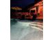 Night view of the pool and patio, beautifully illuminated for evening enjoyment at 10654 Sidlaw Hills Ct, Las Vegas, NV 89141