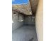 Covered entryway with light-grey walls and wood pergola at 11 Page St, Las Vegas, NV 89110