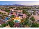 Aerial view of house with pool and mountain views at 1240 Fragrant Spruce Ave, Las Vegas, NV 89123