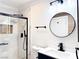 Modern bathroom with marble shower and vanity at 1470 Sutton Dr, Pahrump, NV 89048