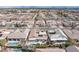 An aerial view of a neighborhood with pools, manicured lawns, and solar panels on the roofs in Las Vegas, Nevada at 1901 Shady Elm St, Las Vegas, NV 89135